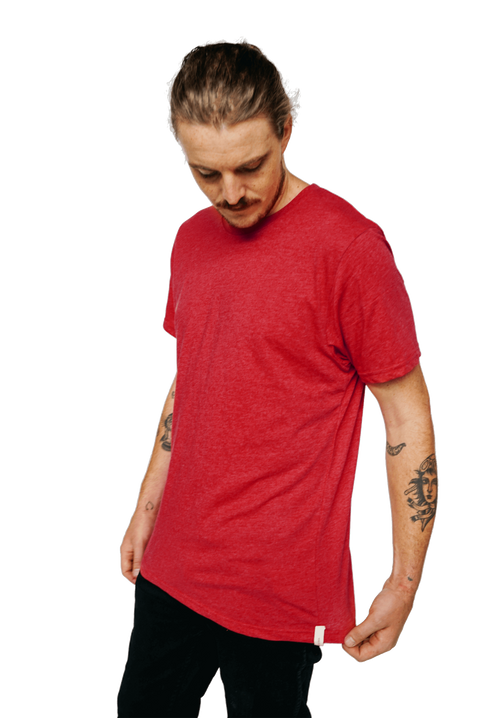 XWASTED Man wearing faded red organic 100% recycled t-shirt 