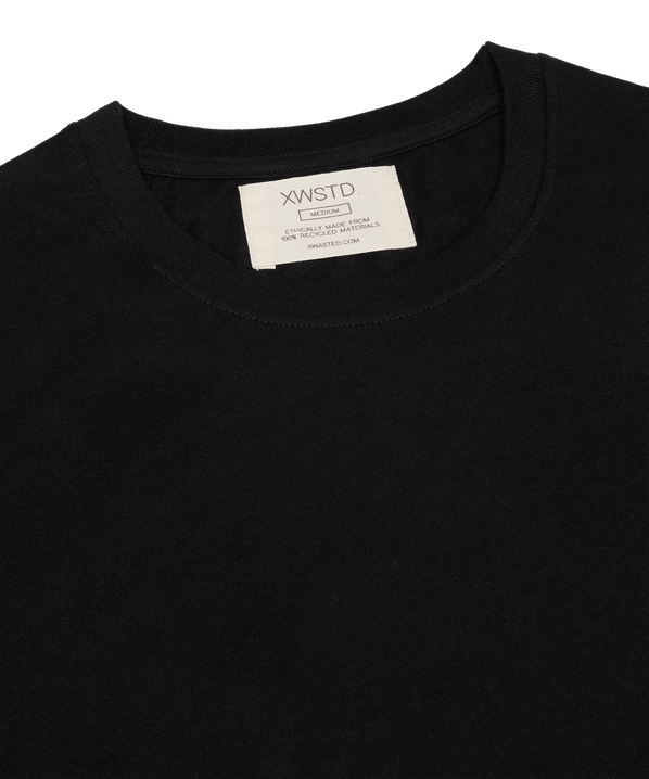 XWASTED neck label of pure black organic 100% recycled t-shirt 
